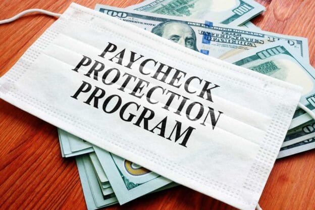 ppp paycheck protection program as sba loan written on the mask 181147250 1