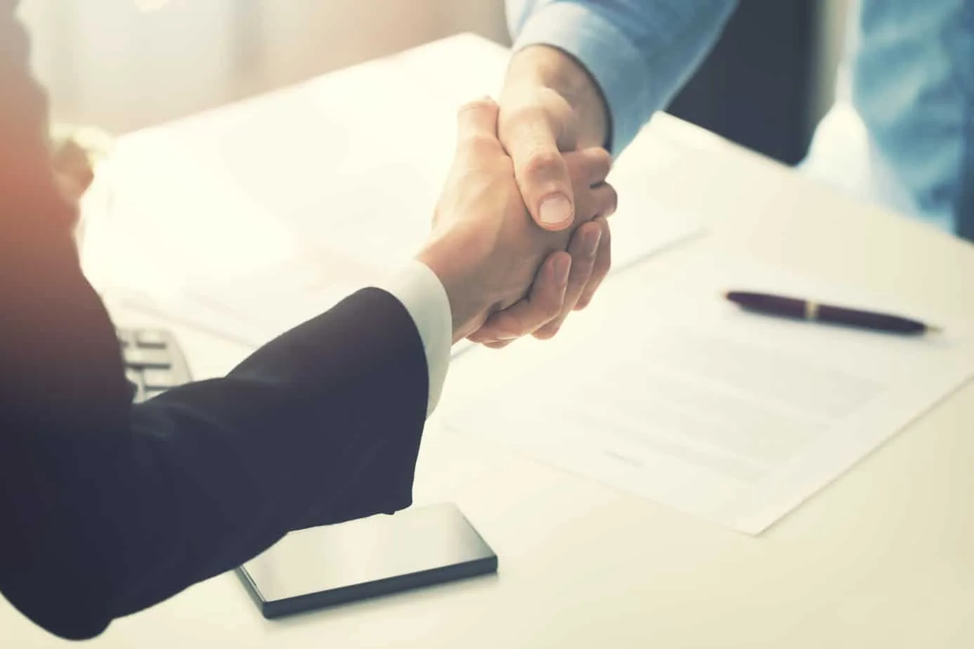 business people handshake after partnership contract signing 94512900 business people handshake after partnership contract signing 94512900