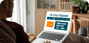 Secure online payment portal on laptop for merchant services.