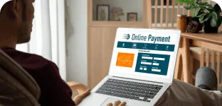 Secure online payment portal on laptop for merchant services.