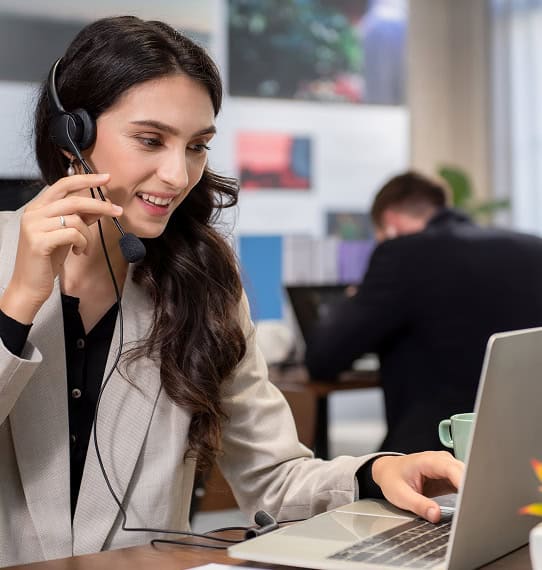 Professional customer support representative using headset at modern business office.