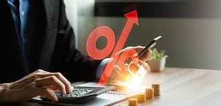 Interest rate increase impacting financial growth and investments.