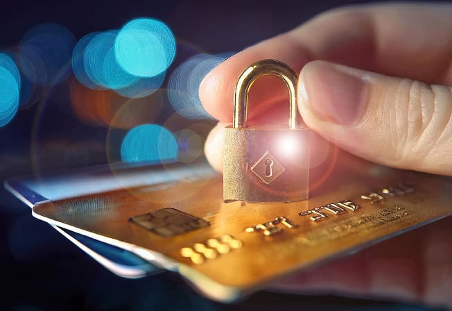 Secure credit card with padlock symbol emphasizing payment security and merchant services security solutions.