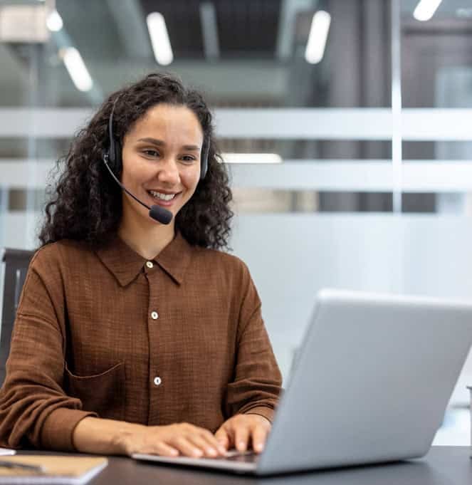 Seamless customer support agent with headset in modern call center.