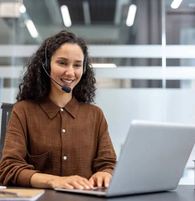 Seamless customer support agent with headset in modern call center.