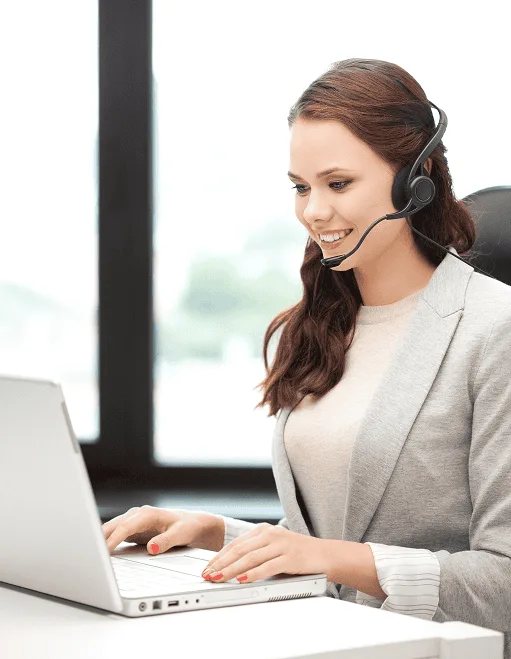 Responsive customer support agent with headset for merchant payment solutions.