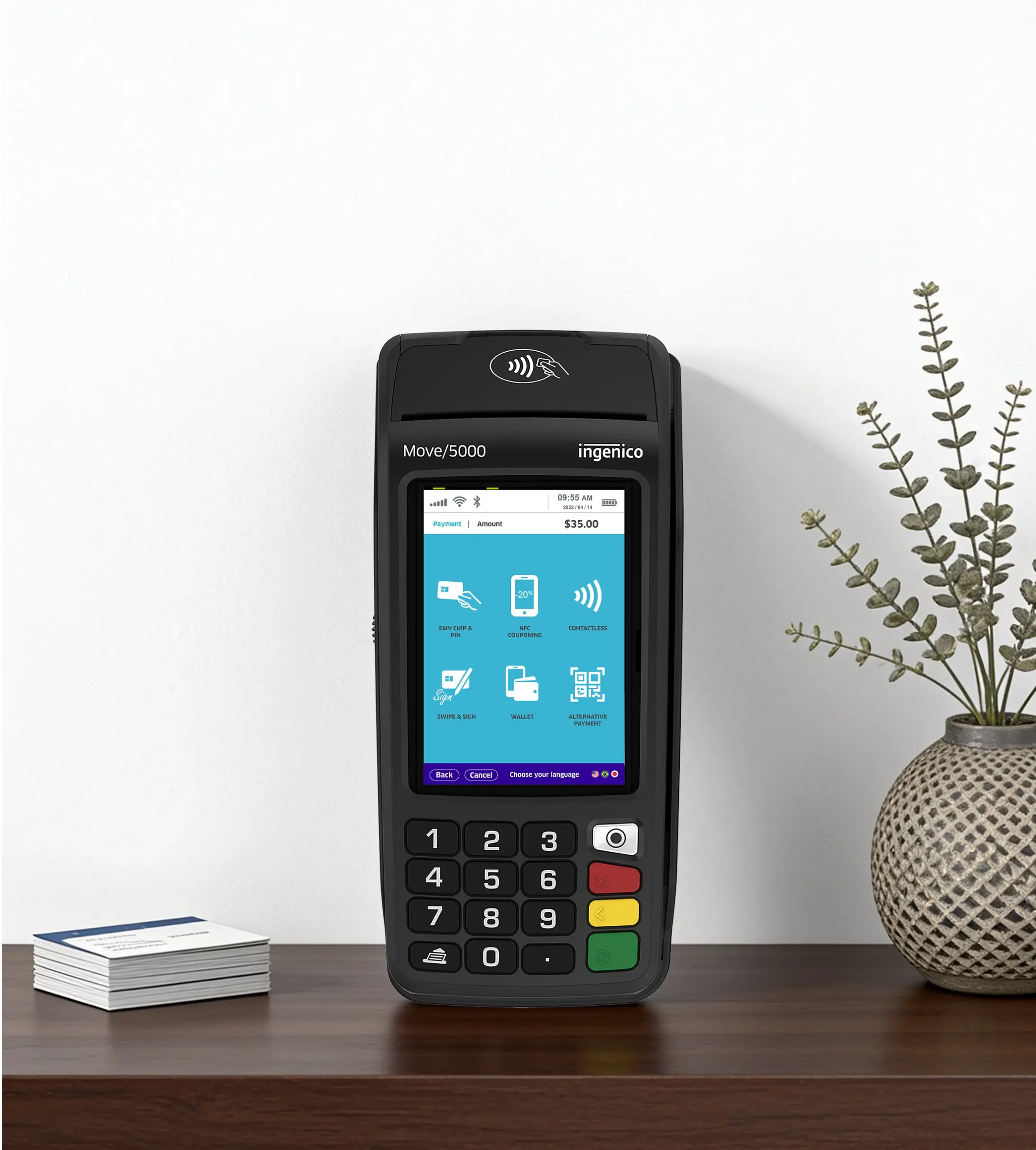 Ingenico Move 5000 portable payment terminal displayed at a checkout counter for secure in-person transactions