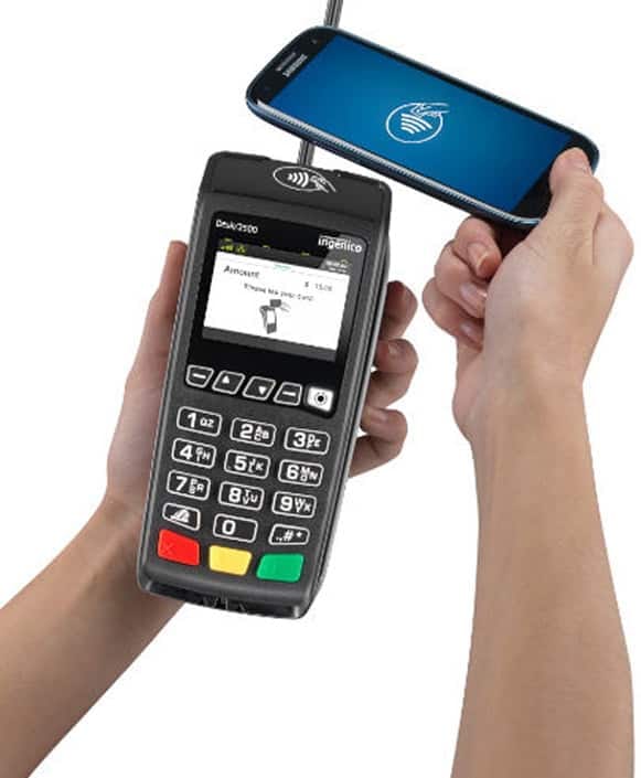 Contactless payment terminal with mobile device for Host Merchant Services solutions.