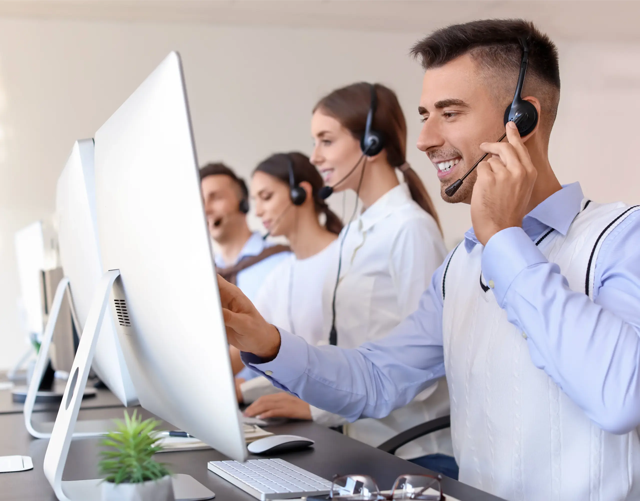 Customer support team assisting merchants with PAX S300 payment terminal questions
