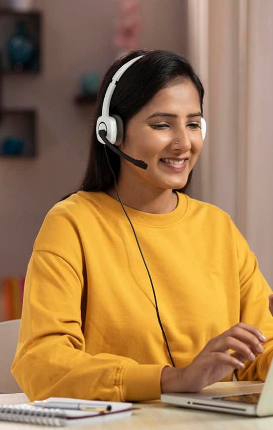 Efficient customer support representative with headset using Host Merchant Services.