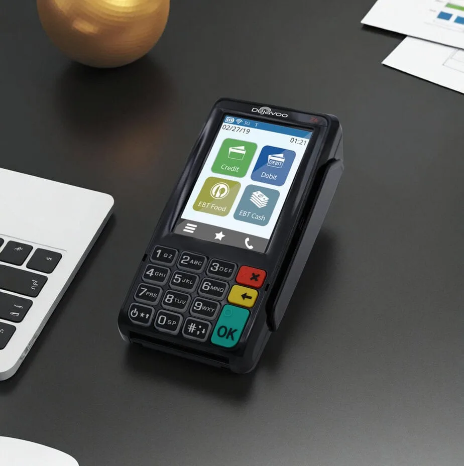 Contactless payment terminal for Host Merchant Services on a dark desk.