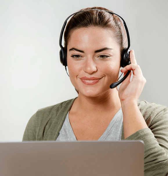 Friendly customer support representative with headset at Host Merchant Services office.