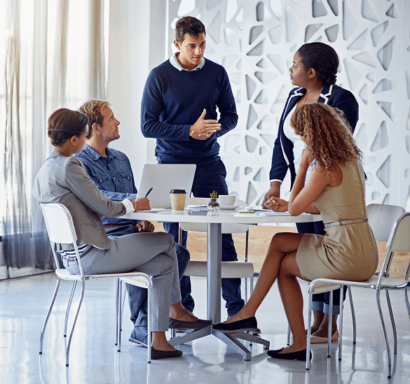 Effective team meeting at Host Merchant Services office for business payment solutions.
