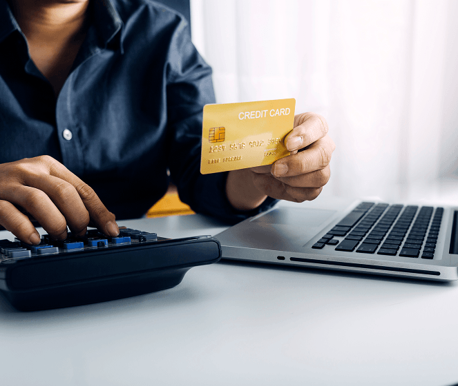 Contactless payment using credit card at night.