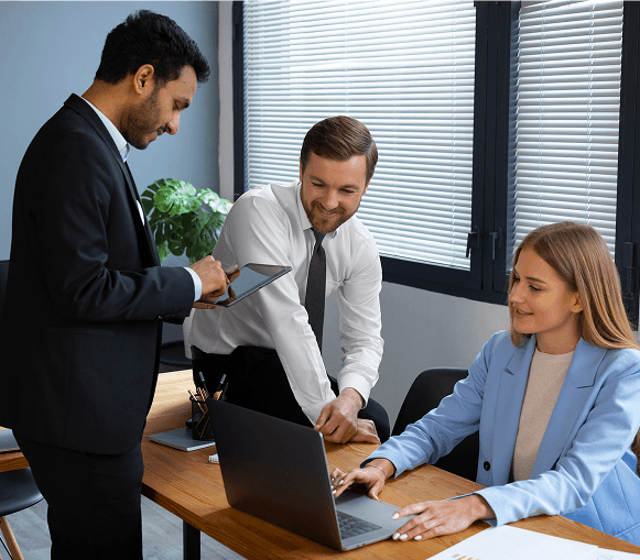 Professional man using a tablet, representing merchant services and payment solutions.