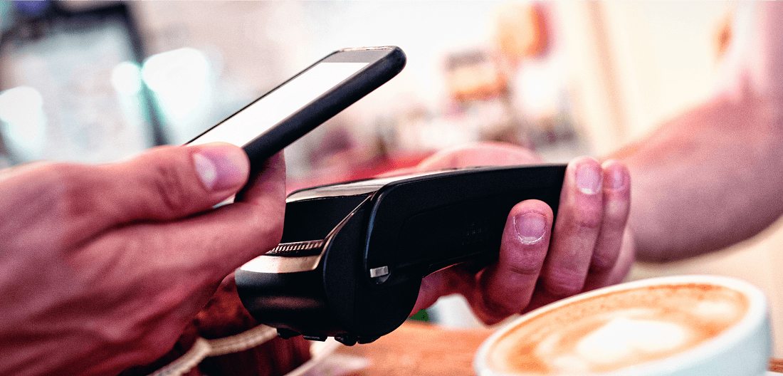 Mobile payment processing with a smartphone and card reader for seamless merchant transactions.
