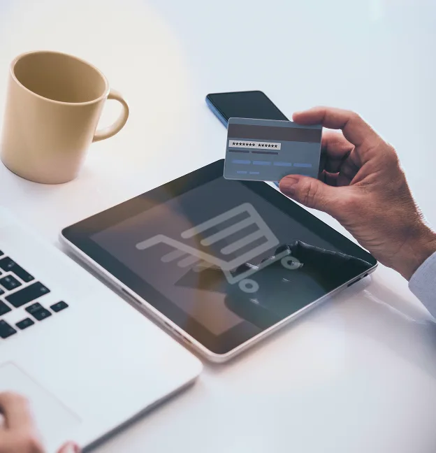 Contactless payment transaction at a retail store with mobile phone and card reader.