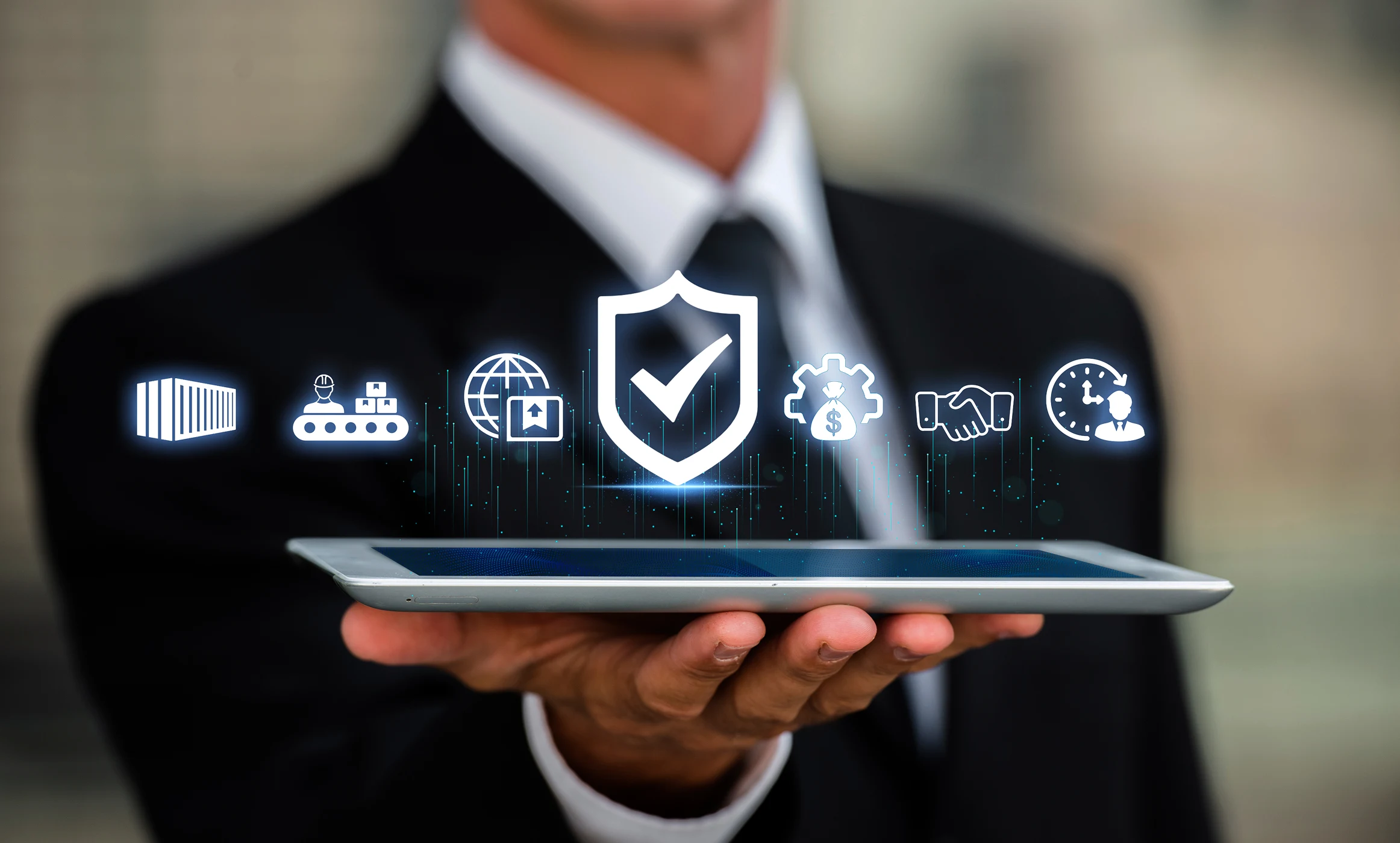 Business professional holding a tablet with digital security and compliance icons representing protected bank payments