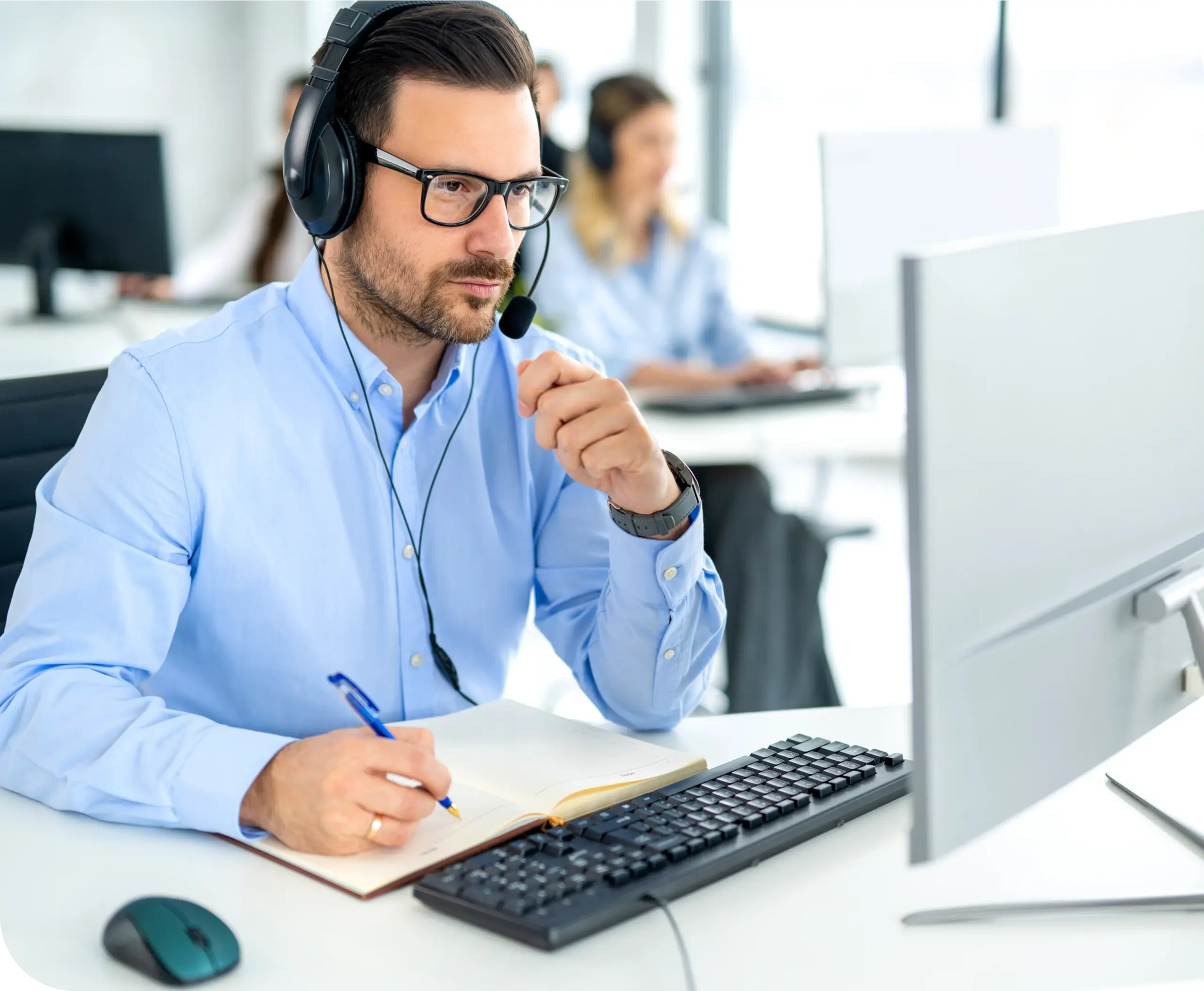 Customer support specialist wearing a headset while assisting businesses with high-risk merchant account and payment processing needs