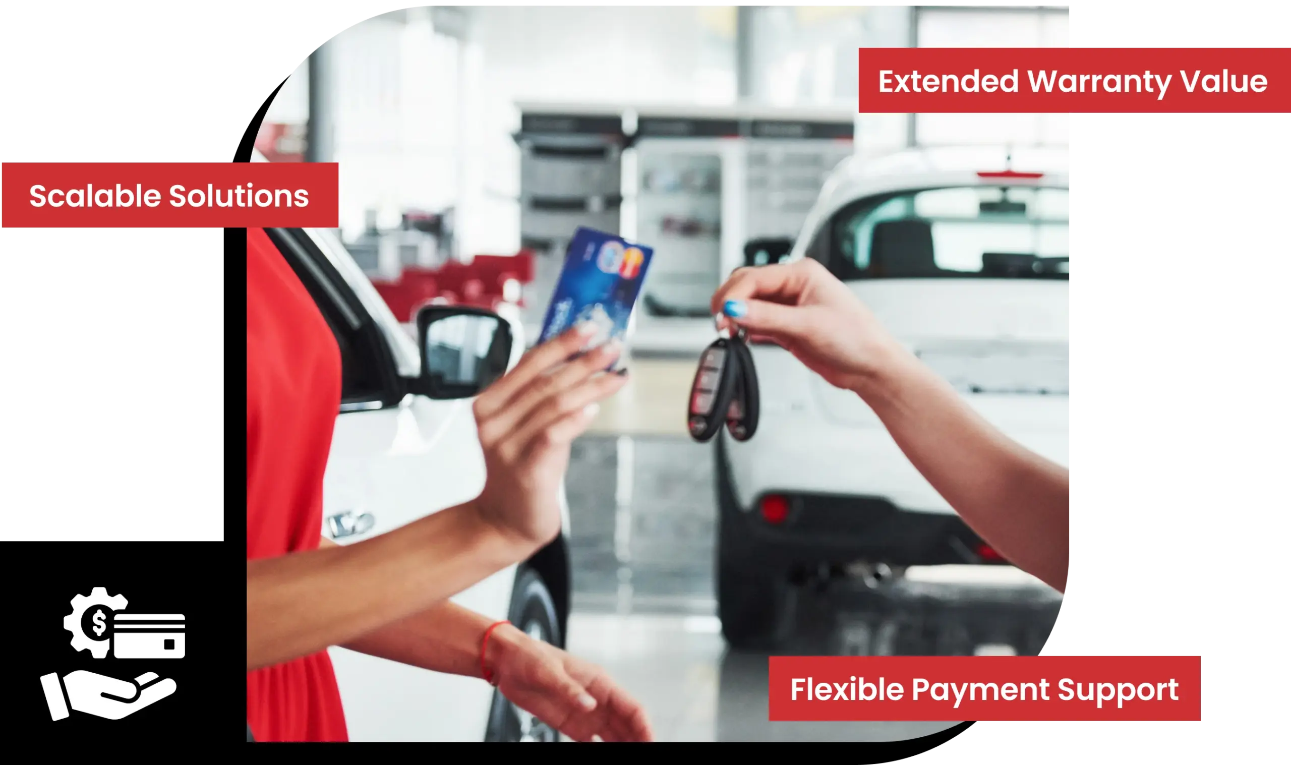 Customer holding a credit card while receiving car keys at an auto dealership, representing extended auto warranty payments