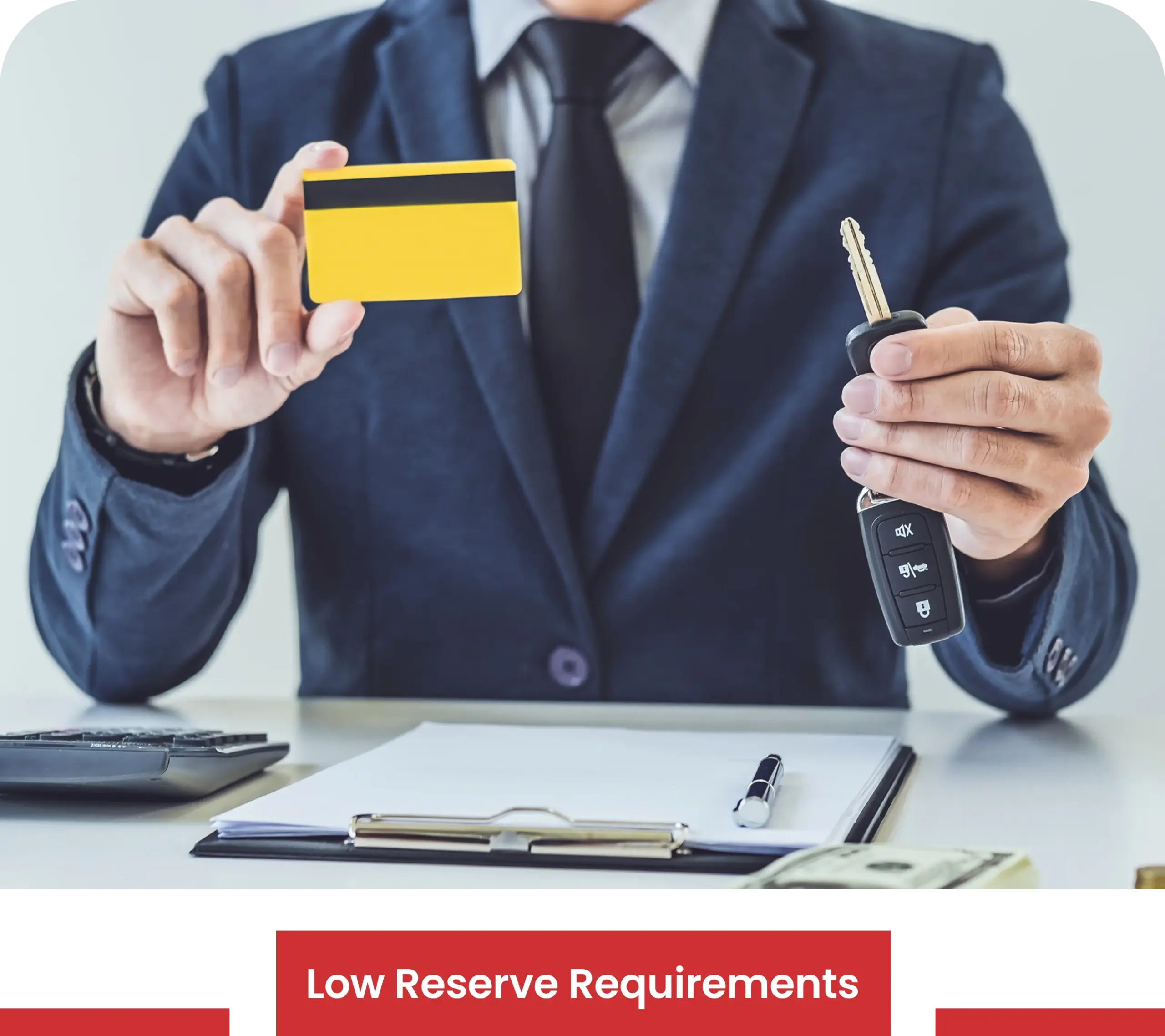 Business professional holding a credit card and car keys, representing automobile warranty payment processing and merchant accounts