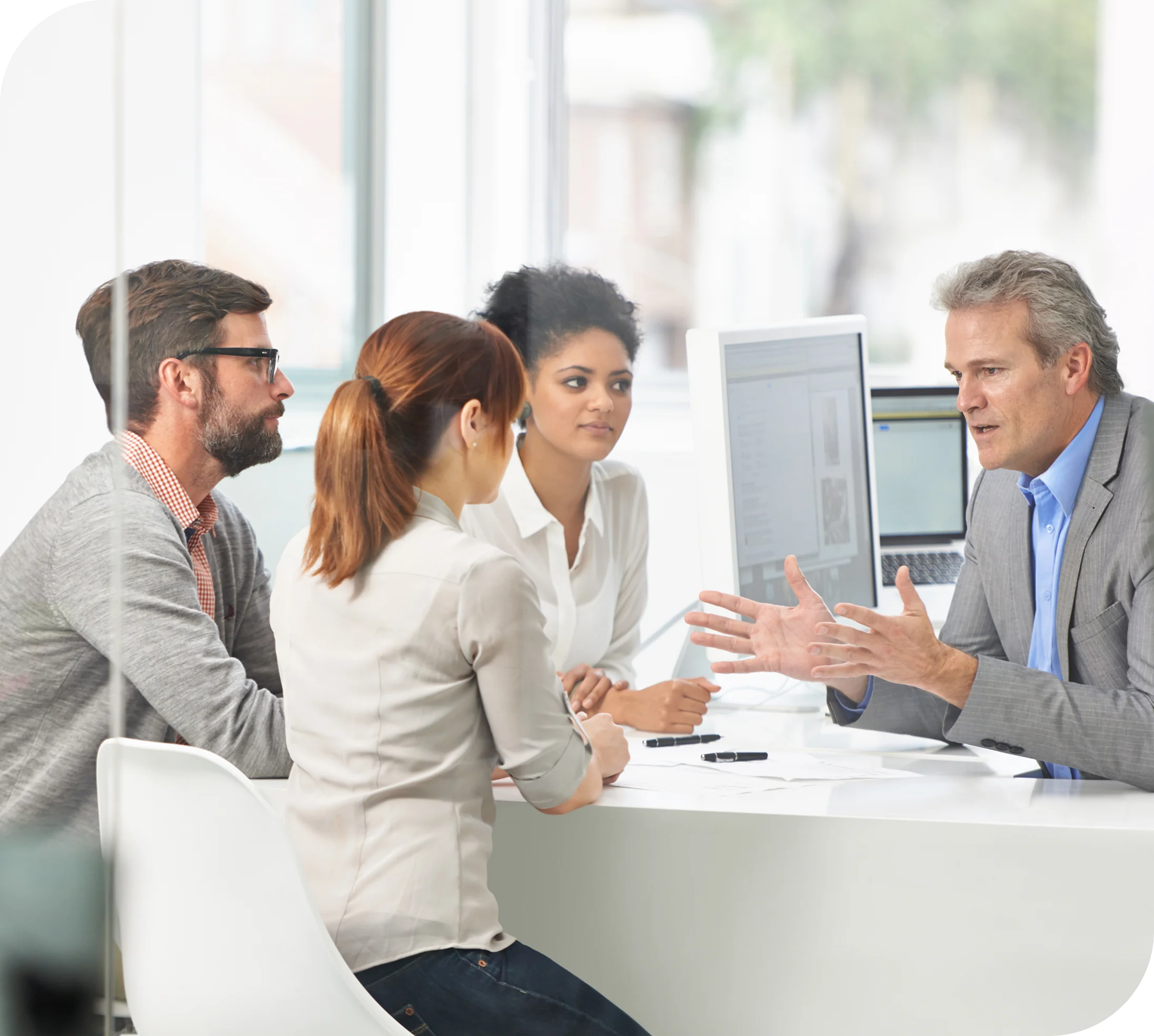 Credit repair professionals meeting with clients to discuss financial services, credit restoration, and business consulting solutions